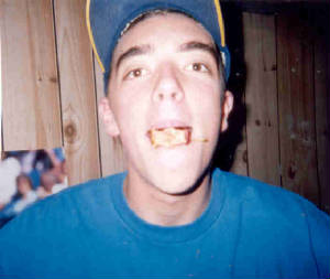 a poparatzi shot of steve eating a rotten apple: why is he doing this?... why?